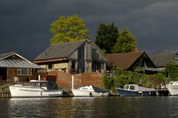 Dark sky and boats on River Thames