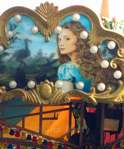 Detail of dodo bird and Alice in Wonderland panel on a fairground ride