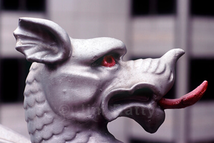 Close-up view of red-eyed and tongued silver dragon head, Holborn Viaduct